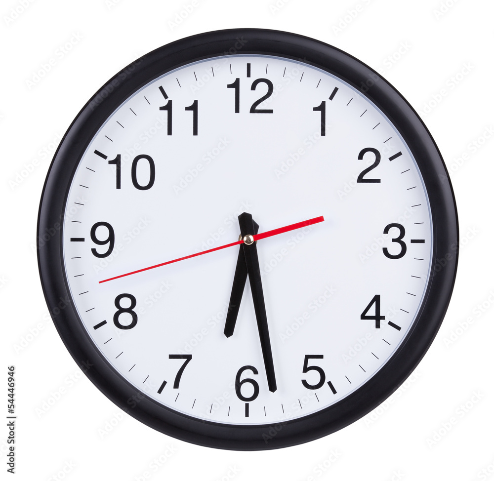 Round clock shows half of the seventh Round clock shows half of the seventh