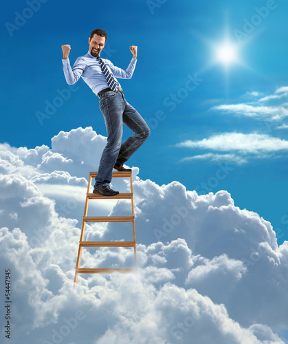 businessman standing at the top of ladder high in the sky