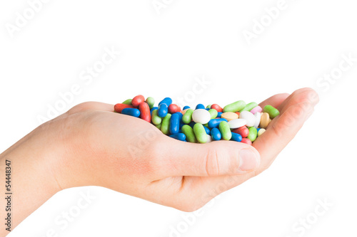 Hand with different pills