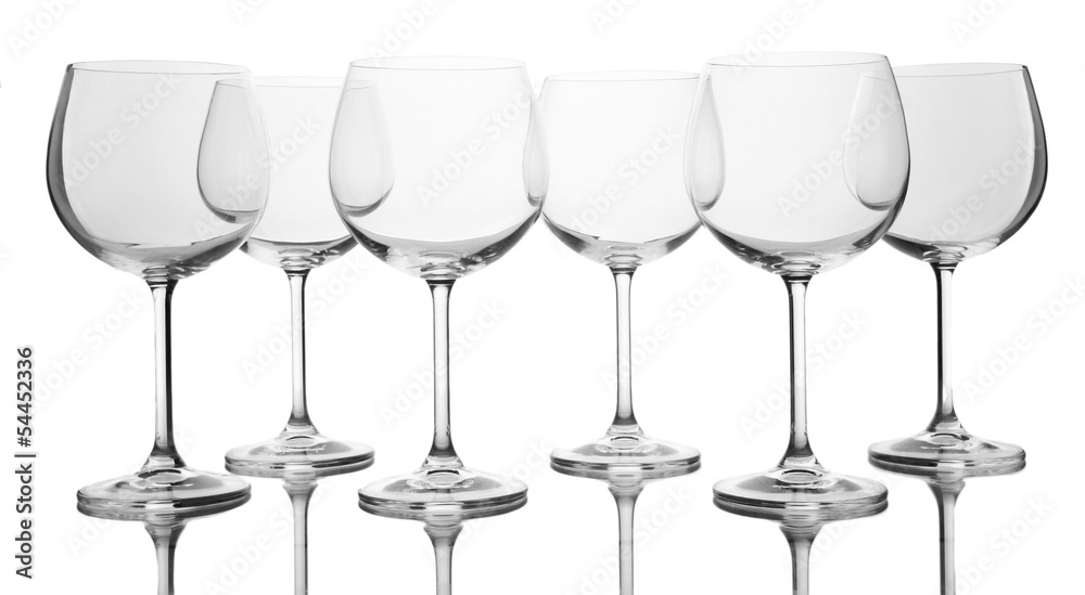 Empty wine glasses arranged and isolated on white Empty wine glasses arranged and isolated on white