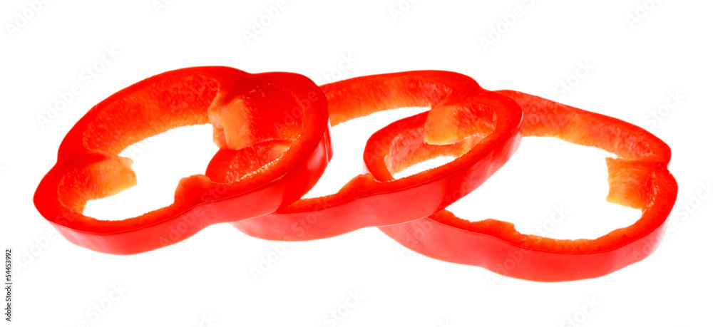 Fresh red pepper slices isolated on white Fresh red pepper slices isolated on white