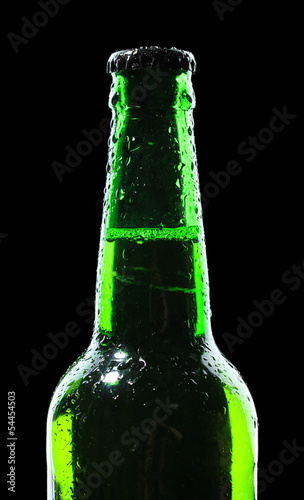 Bottle of beer on black background