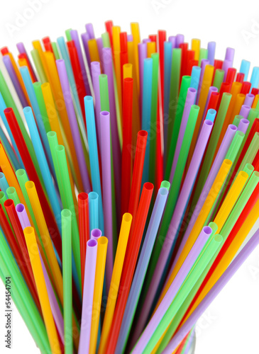 Many straws close-up isolated on white