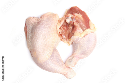 raw chicken legs on white background