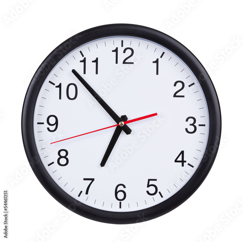 Office clock shows almost seven o'clock