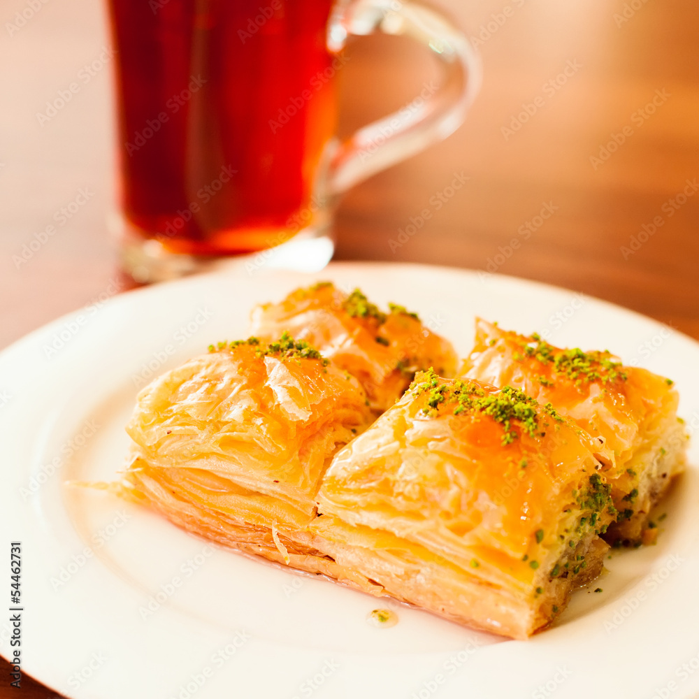 Oriental sweets baklava served with cup of tea Oriental sweets baklava served with cup of tea