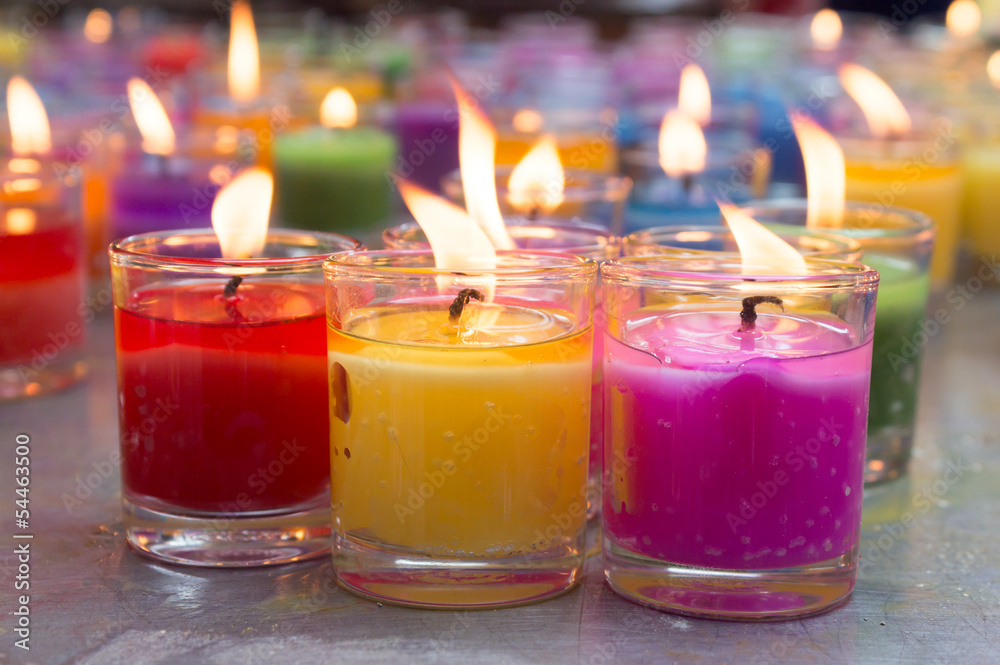 colorful burning candles - obrazy, fototapety, plakaty 