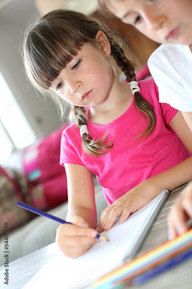 Portrait of kids at home drawing with pencils Portrait of kids at home drawing with pencils