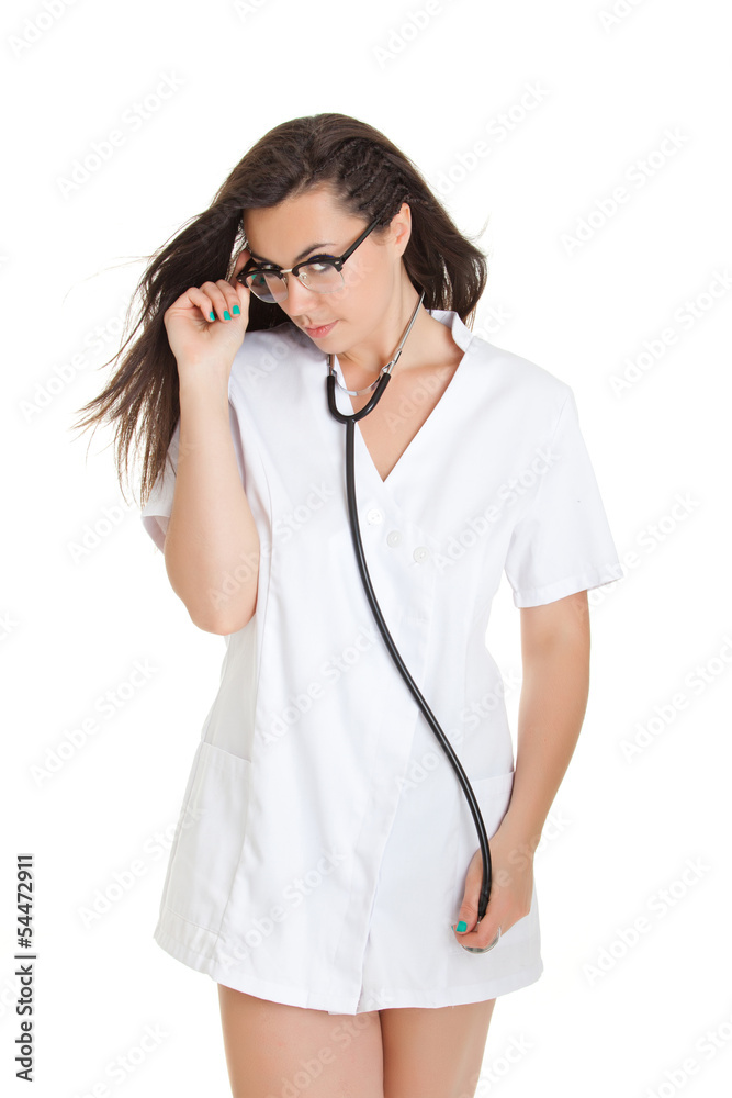 Sexy nurse with stethoscope. female doctor - isolated over a wh Sexy nurse with stethoscope. female doctor - isolated over a wh