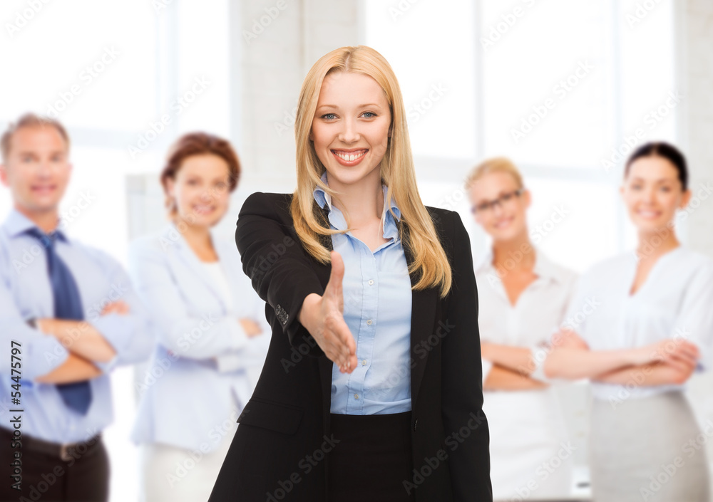 woman with an open hand ready for handshake woman with an open hand ready for handshake
