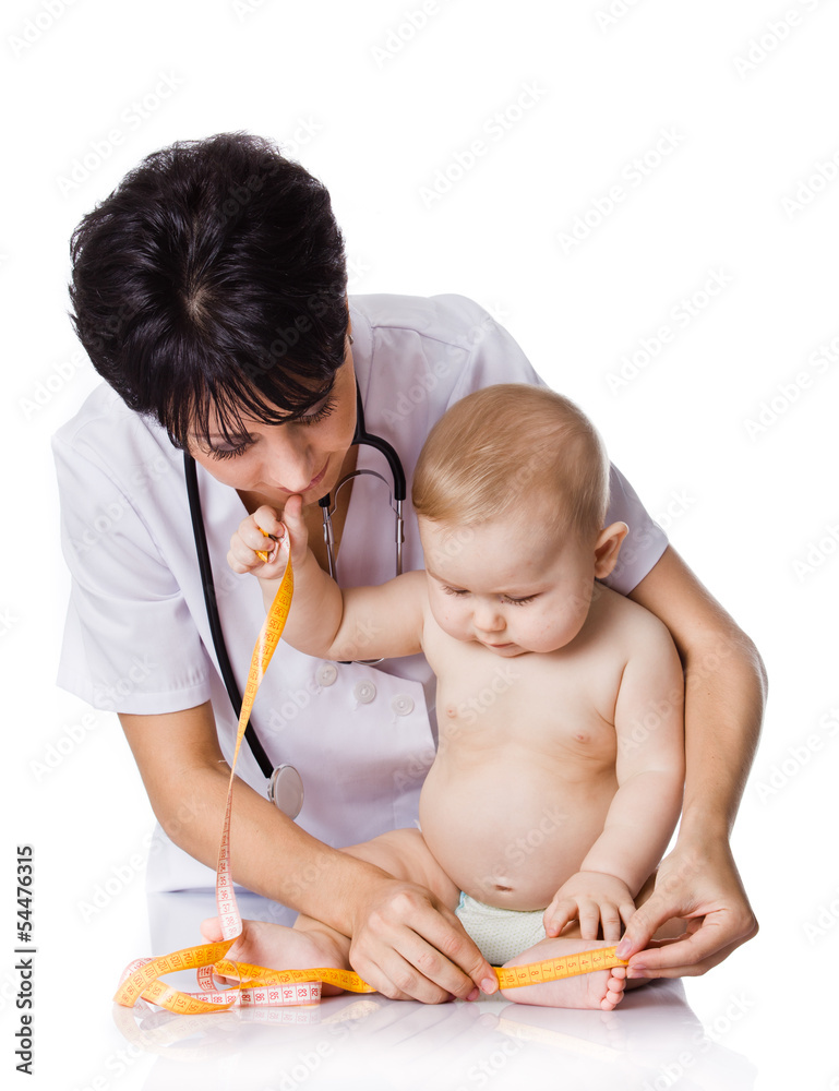 beautiful doctor and baby on a white background. Doctor measures - obrazy, fototapety, plakaty 