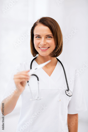 doctor with thermometer and stethoscope