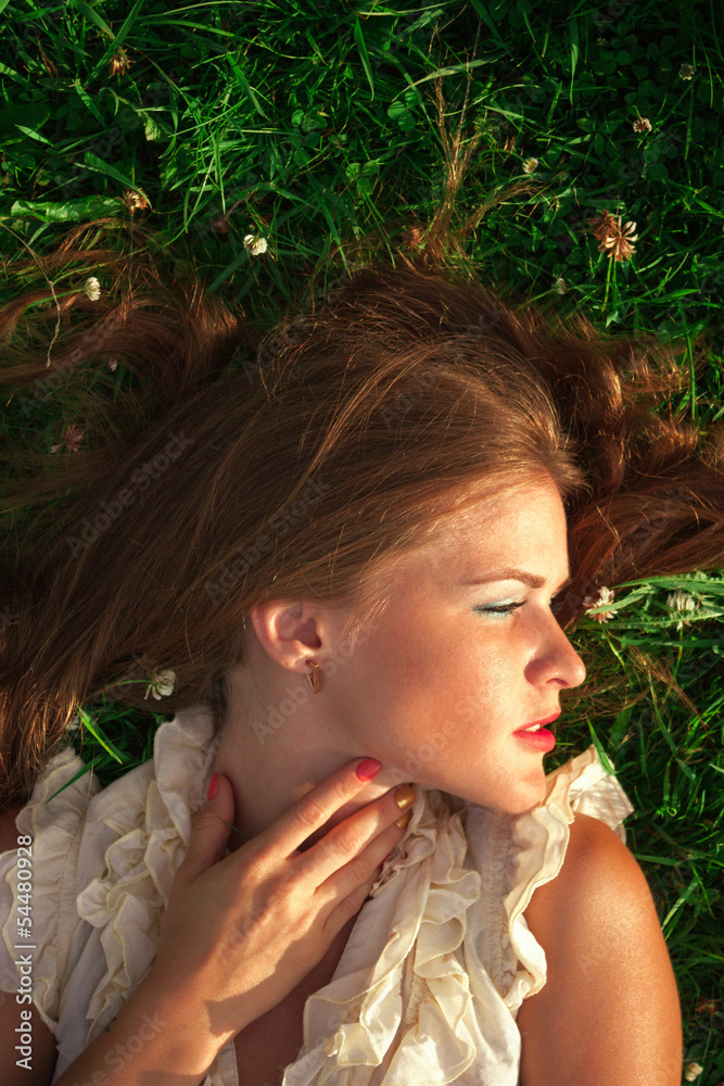 Portrait of young beautiful woman in park Portrait of young beautiful woman in park