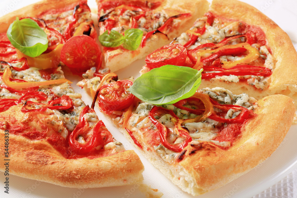 Blue cheese pizza with strips of pepper on top
