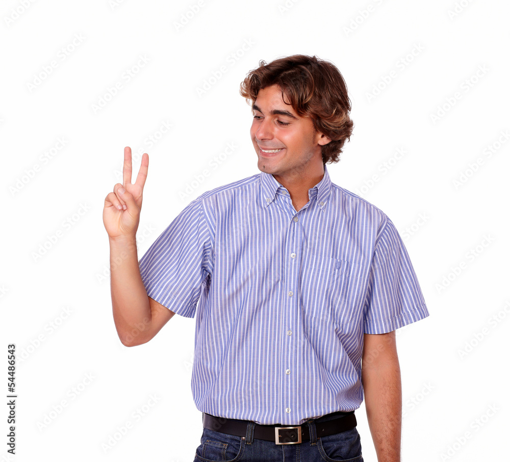 A stylish latin man smiling positive with victory A stylish latin man smiling positive with victory
