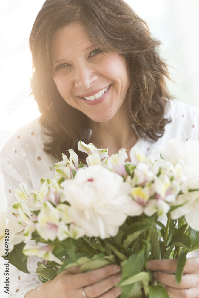 Cheerful Woman Holding Flower Bouquet Cheerful Woman Holding Flower Bouquet