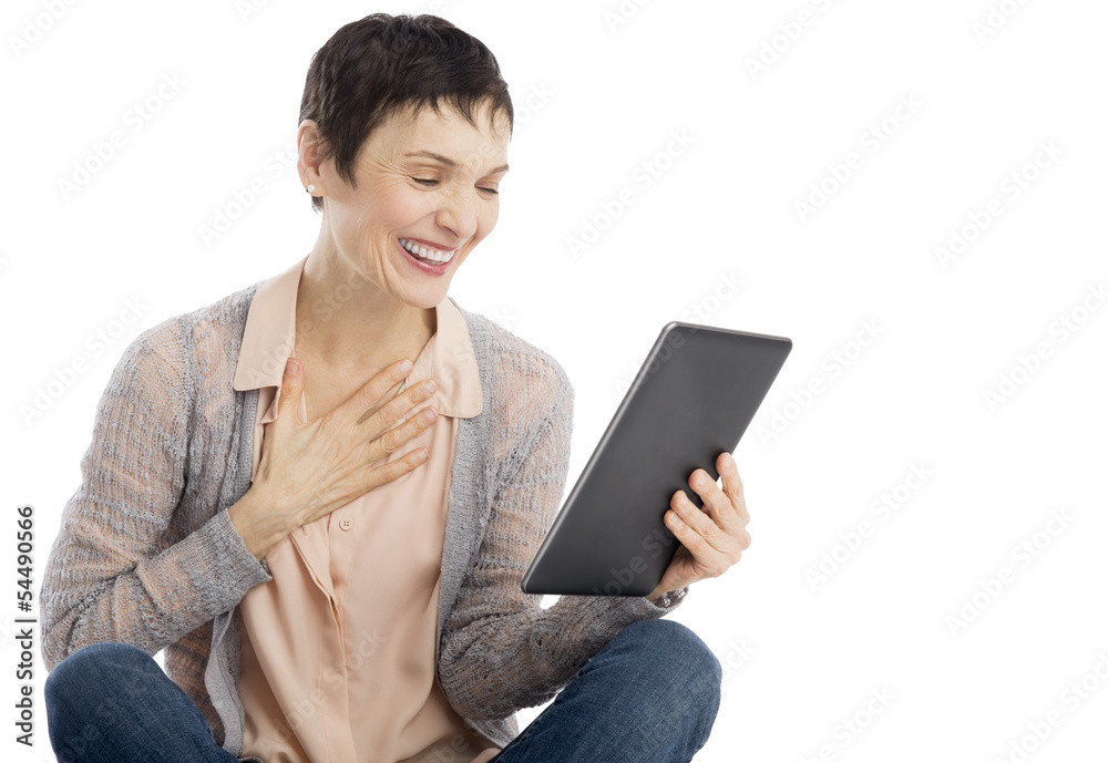 Delighted Woman Looking At Digital Tablet Delighted Woman Looking At Digital Tablet