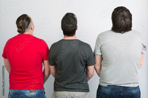 Foto Three gay men in T-shirts are back