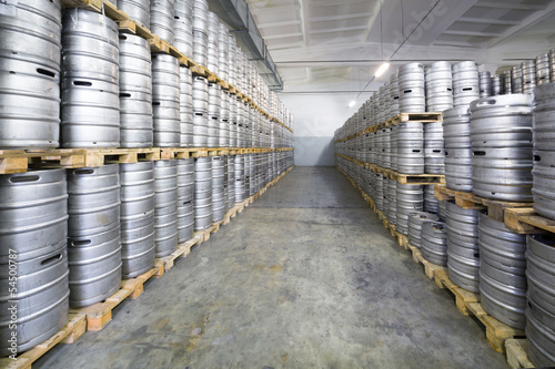 Fotografie Rows of beer kegs in stock brewery