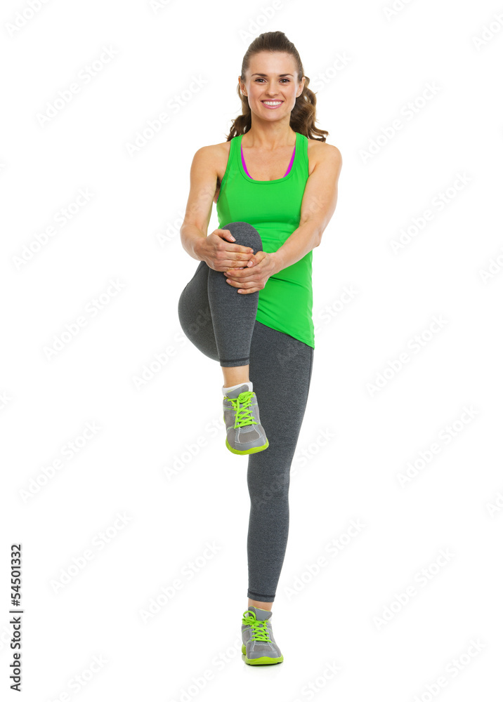 Happy healthy young woman stretching Happy healthy young woman stretching