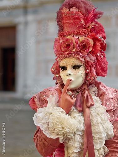 Fototapeta Naklejka Na Ścianę i Meble -  Venetian costume attends Carnival of Venice.
