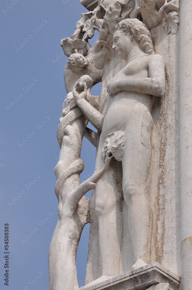 Sculpture of Eve at the corner of the Doges Palace in Venice