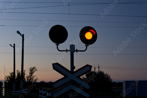 Obraz na plátně Red signal at a railway crossing