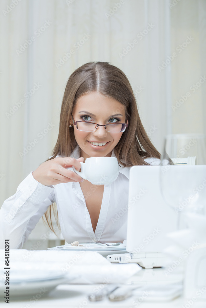 Business woman drinking coffee in restaurant Business woman drinking coffee in restaurant