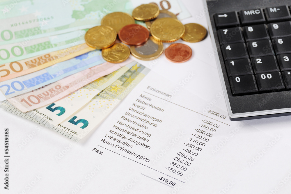 Fototapeta premium Euro bill and Coins with chart and calculator
