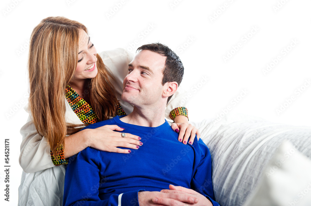 Fototapeta premium Young couple relaxing on the sofa