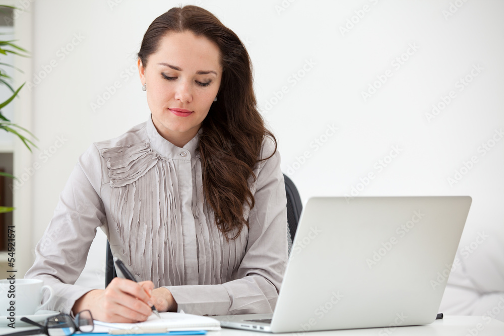 writting woman with laptop writting woman with laptop