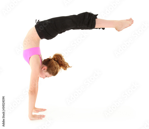 Photography Beautiful strong child in a handstand with legs held out. Clippi