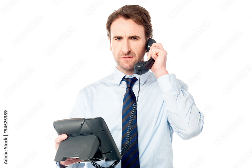 Business professional attending call