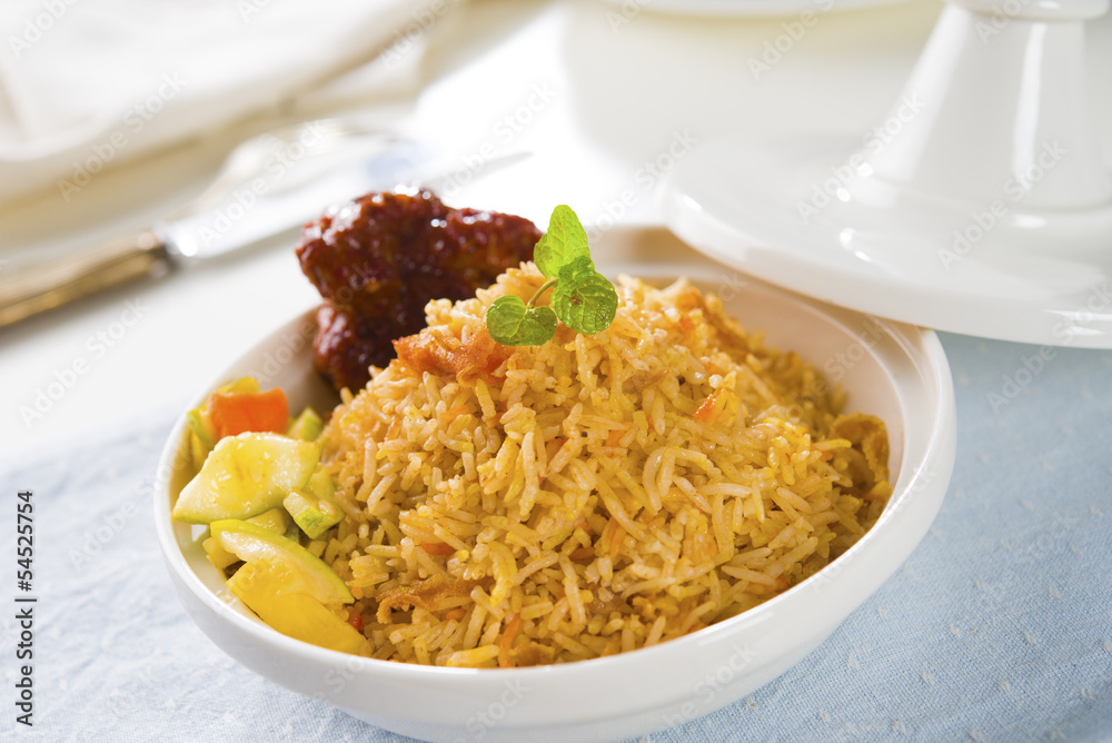 Biryani chicken rice cooked in arab style tajine with traditiona