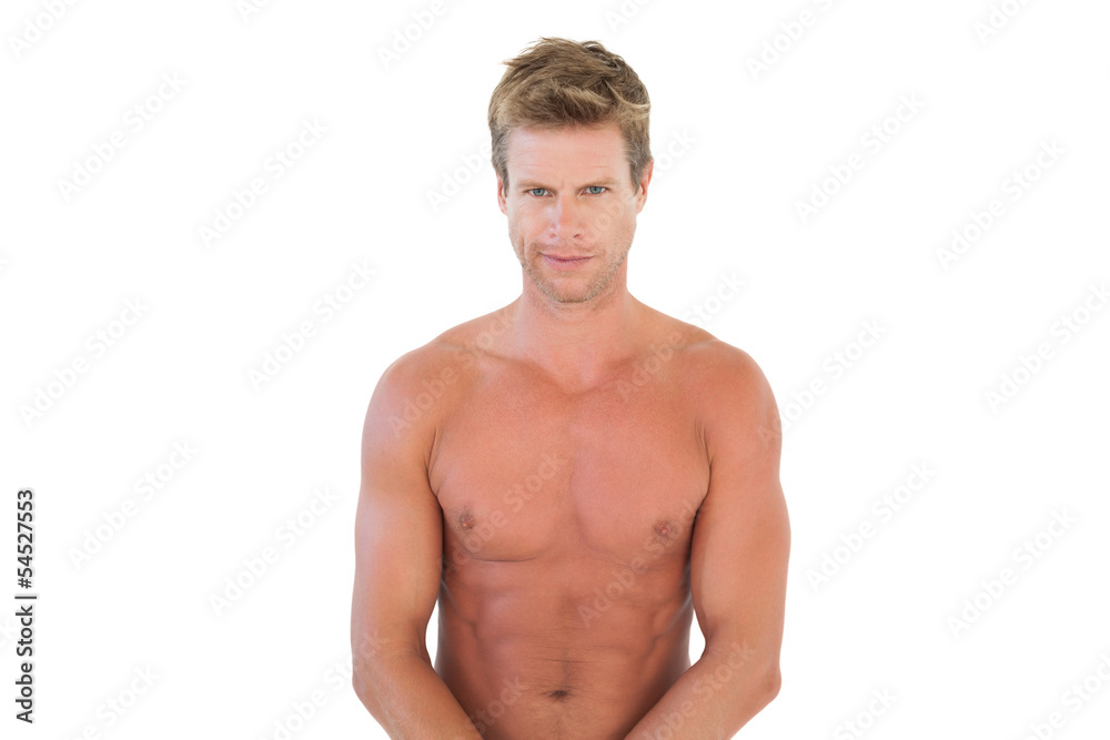 Handsome shirtless man flexing muscles