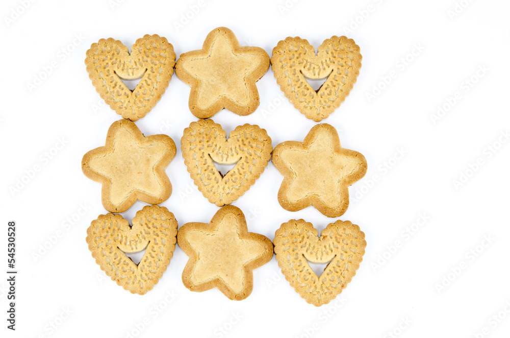 Star and heart shaped biscuits - Abstract background