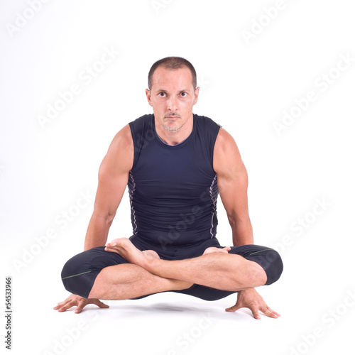 Practicing Yoga exercises: Scale Pose - Tolasana