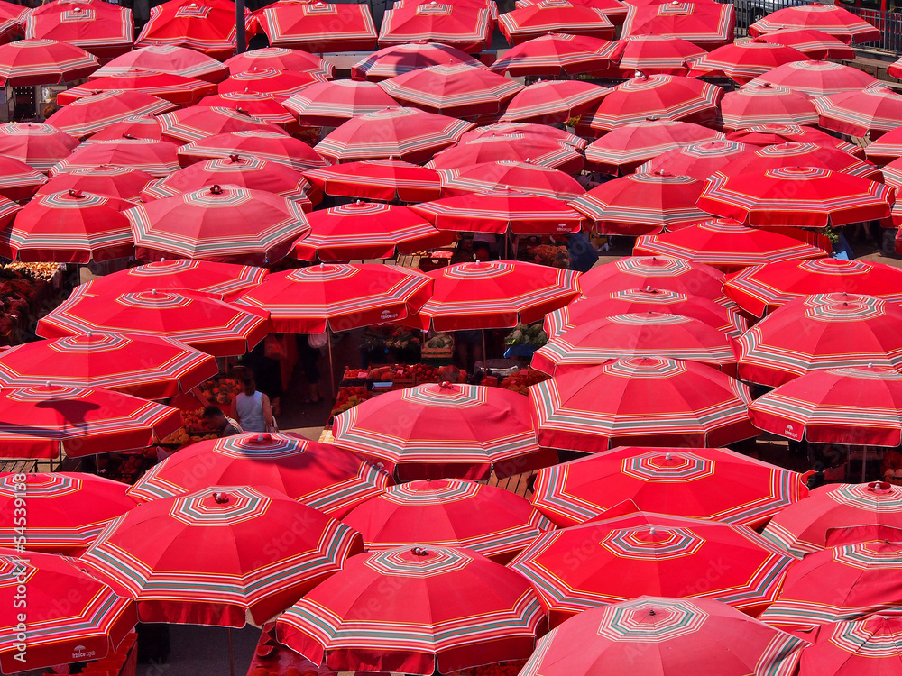 Naklejka premium Umbrellas on the farmer's market