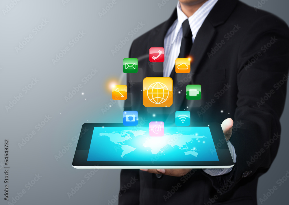 Touch screen tablet with cloud of colorful application icons Touch screen tablet with cloud of colorful application icons