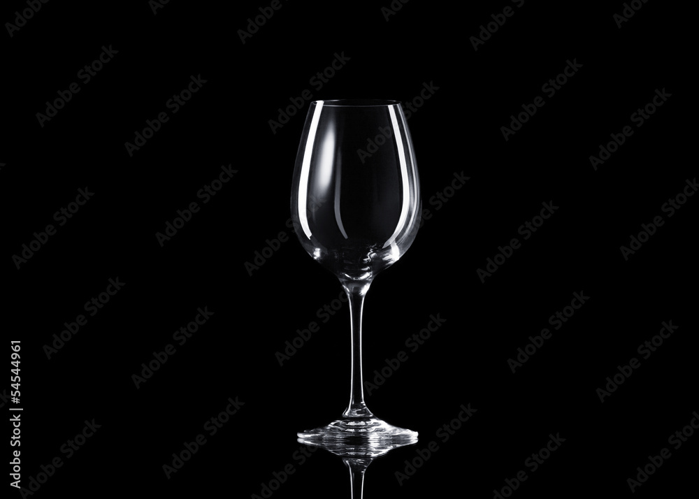 Empty glass of wine on black background Empty glass of wine on black background