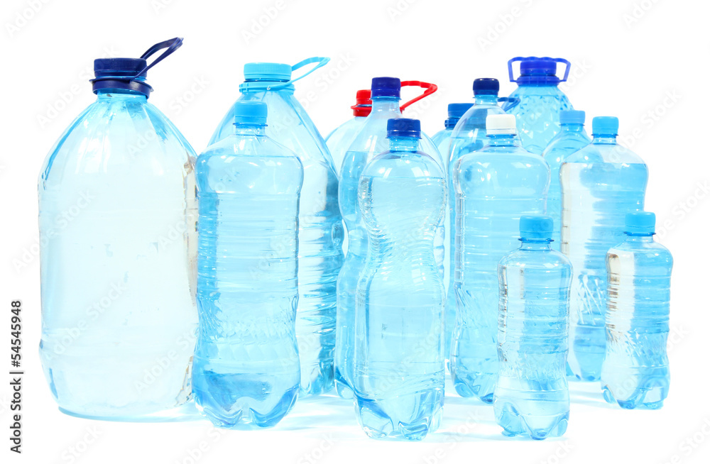 Water in big bottles isolated on white