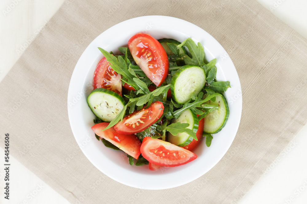 served plate with mix salad from tomatoes and cucumbers served plate with mix salad from tomatoes and cucumbers