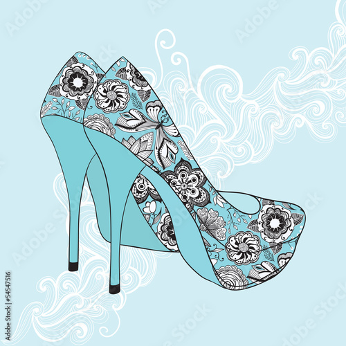 A high-heeled vintage shoes with flowers fabric. High heels back