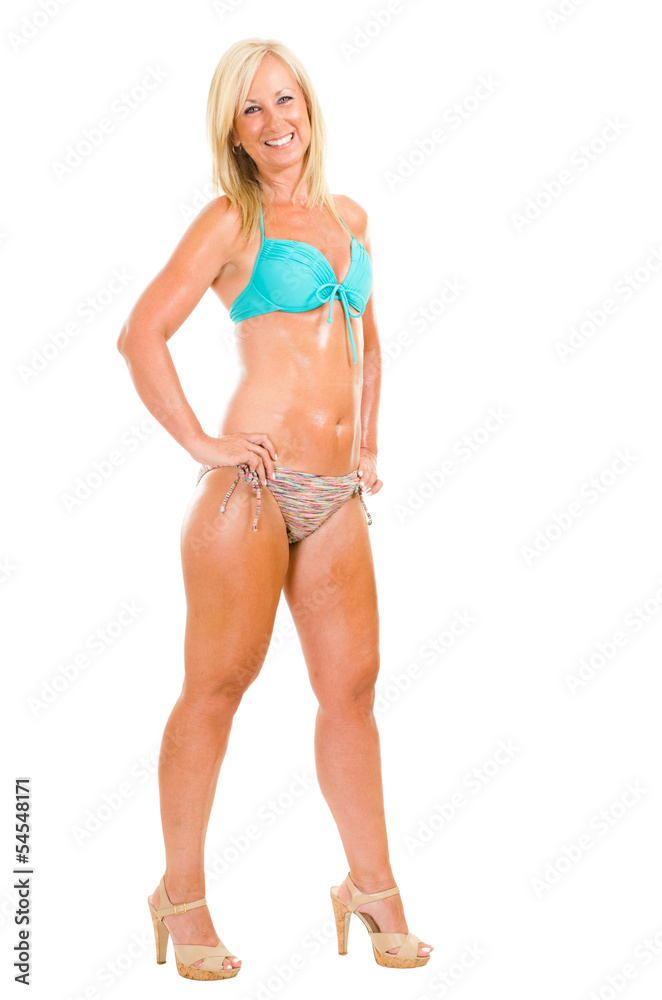 Healthy middle aged woman wearing bikini isolated on white Healthy middle aged woman wearing bikini isolated on white