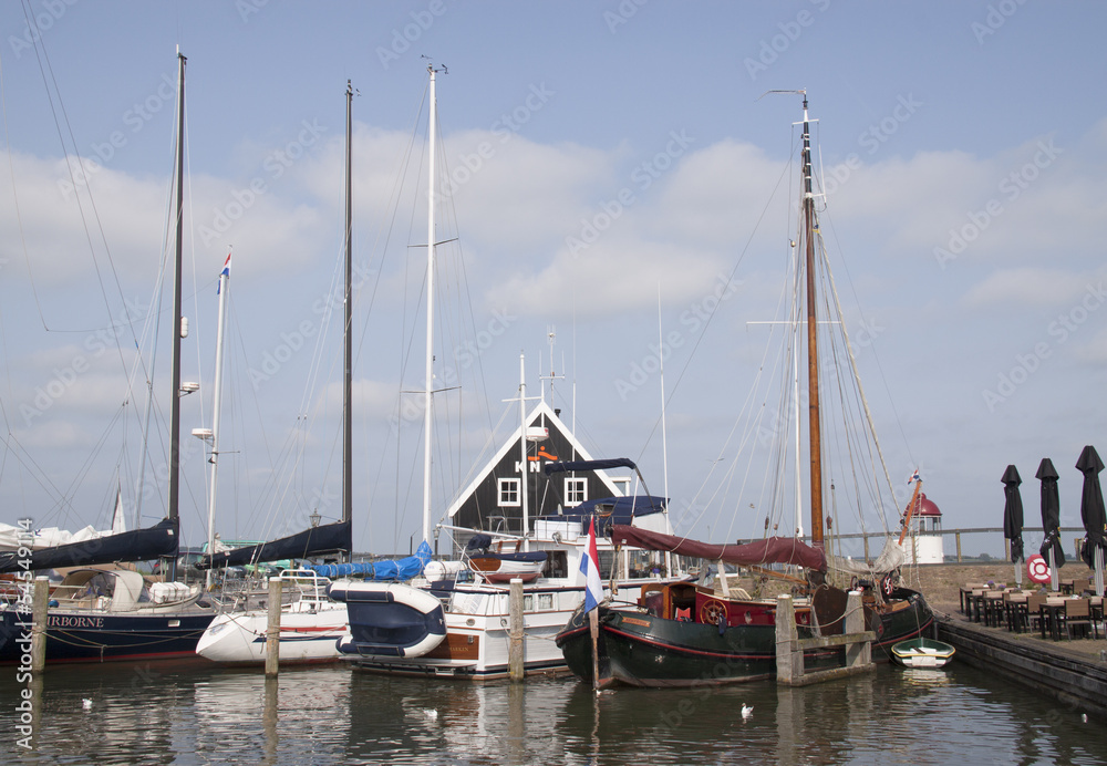 Sailing ships in the harbour of Marken