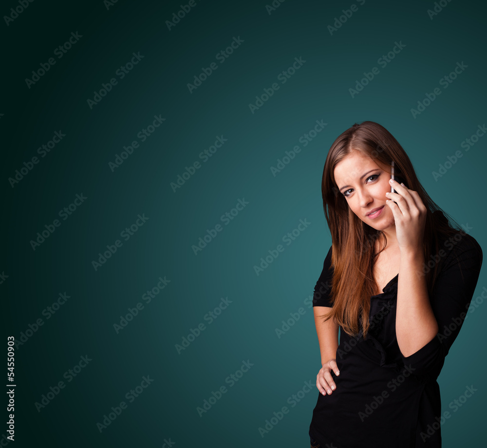 Young woman making phone call with copy space Young woman making phone call with copy space