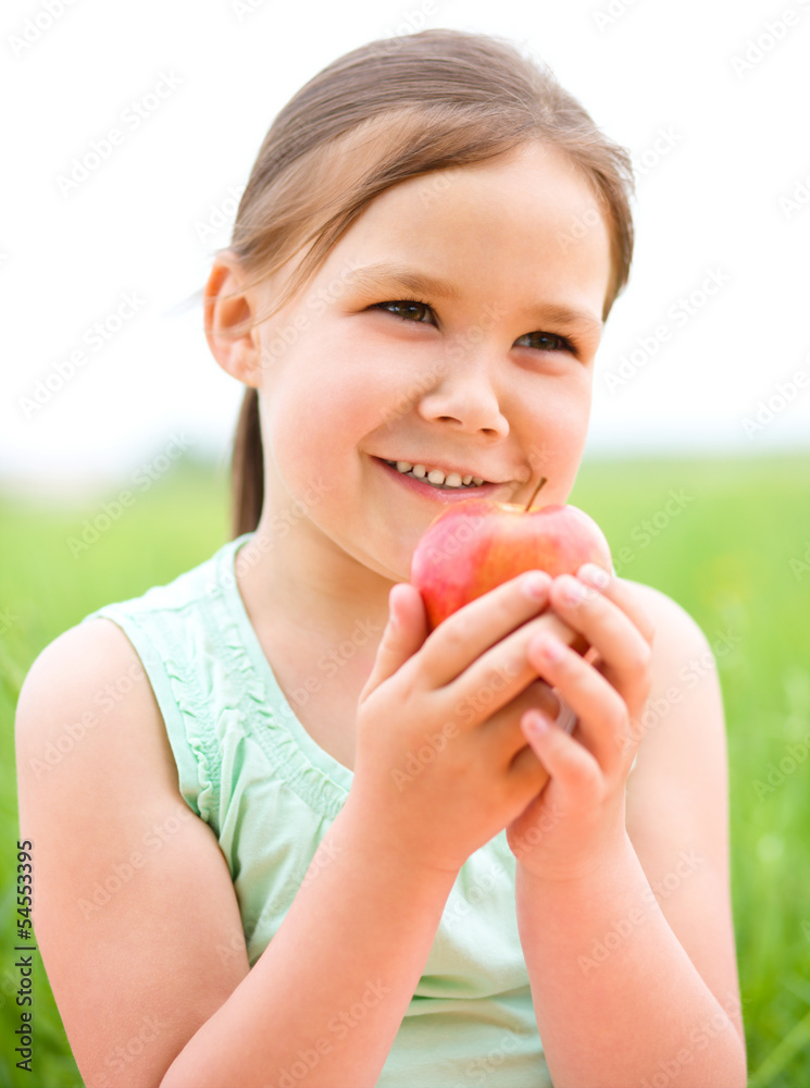 Portrait of a little girl with apple Portrait of a little girl with apple