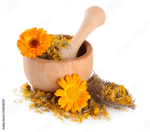 Fototapeta Naklejka Na Ścianę i Meble -  Fresh and dried calendula flowers in wooden mortar  isolated