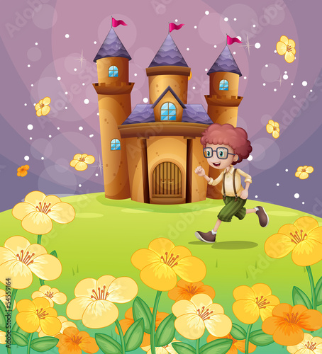 A boy running in front of the castle with flowers