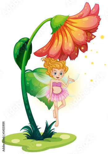 A fairy flying under the giant flower